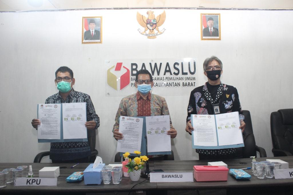 BAWASLU KPU DAN KPID TANDATANGANI NOTA KESEPAHAMAN